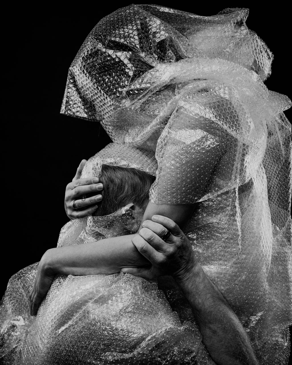 Blessed Mother (Medium) People wrapped in bubble wrap